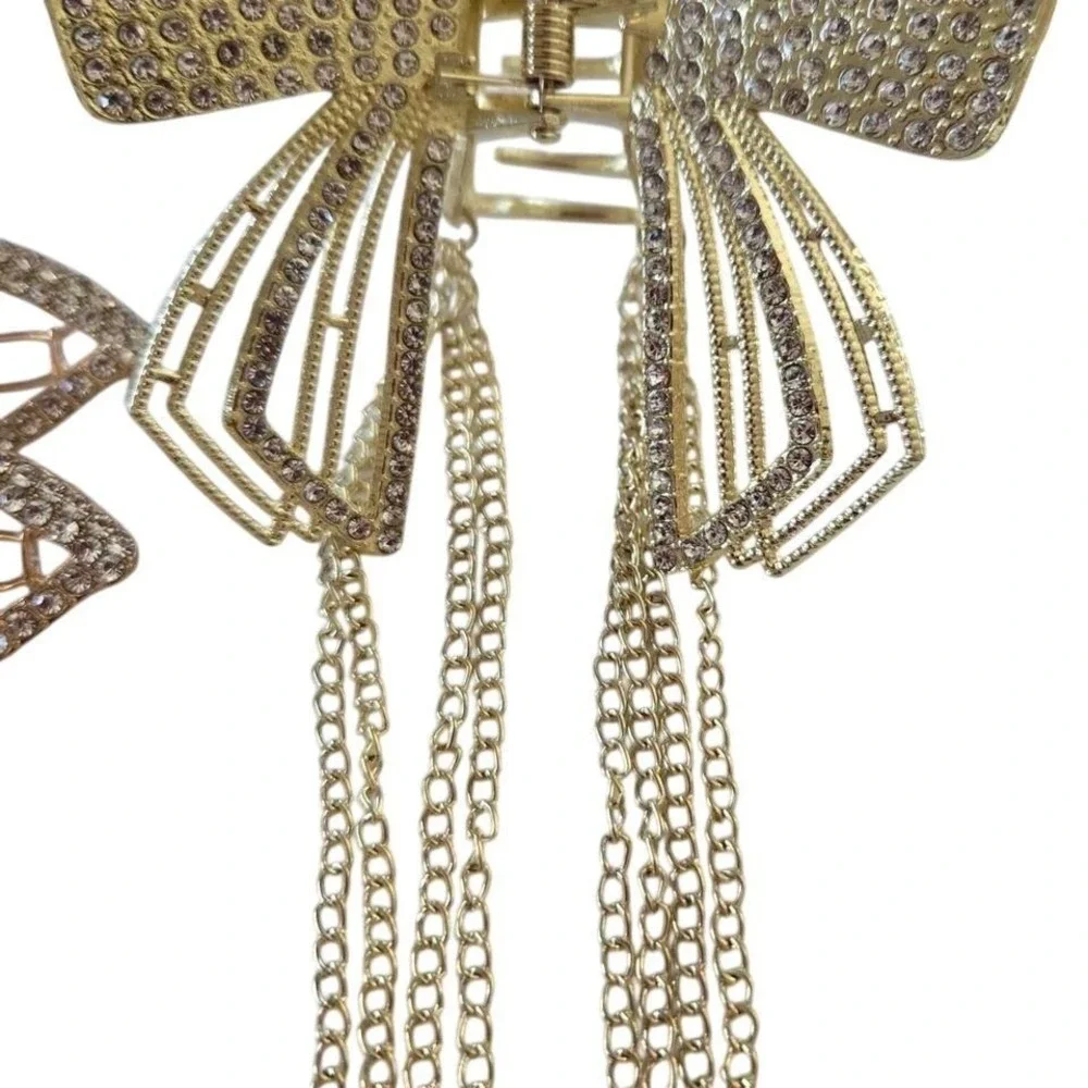 Lot of 8,‎ NEW Gold hair clips, claws and slides with rhinestones and tassels.